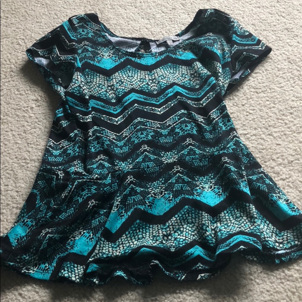Green patterned peplum top